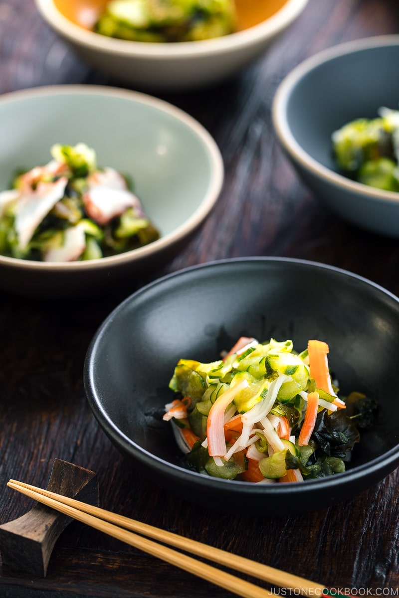 4 kinds of Sunomono (Japanese Cucumber Salad) in bowls..