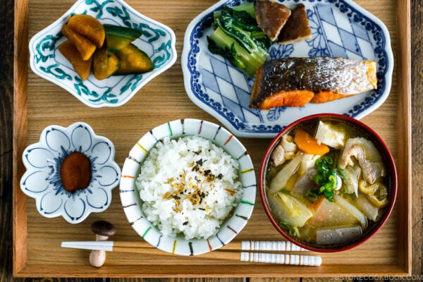 Tonjiru (Pork and Vegetable Soup) served with grilled salmon, steamed rice, and vegetable side dishes.