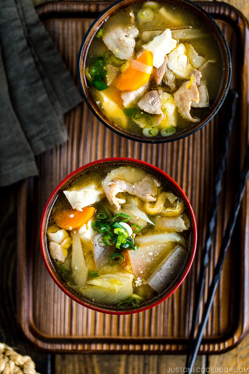 Wooden miso soup bowls containing Tonjiru (Pork and Vegetable Soup).