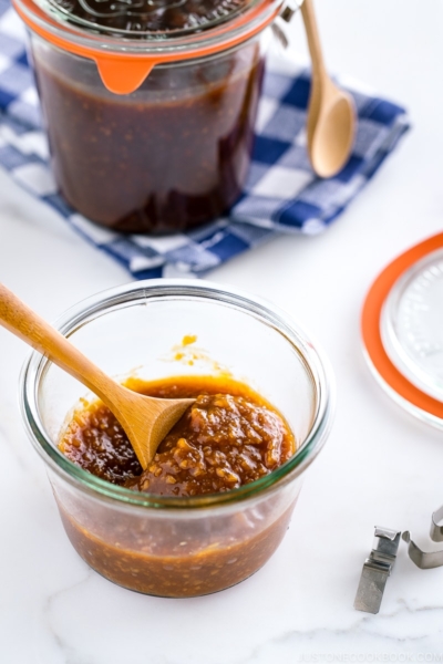 A glass jar containing homemade all purpose miso sauce.