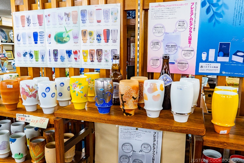 beer glass on display inside porcelain shops at Arita Sera