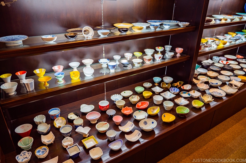 dinnerware on display inside porcelain shops at Arita Sera