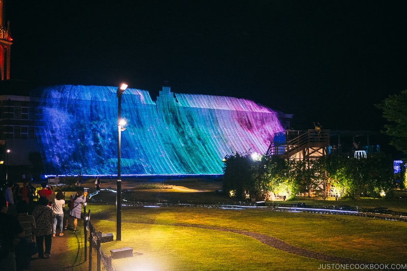 lightshow on a building at the art garden