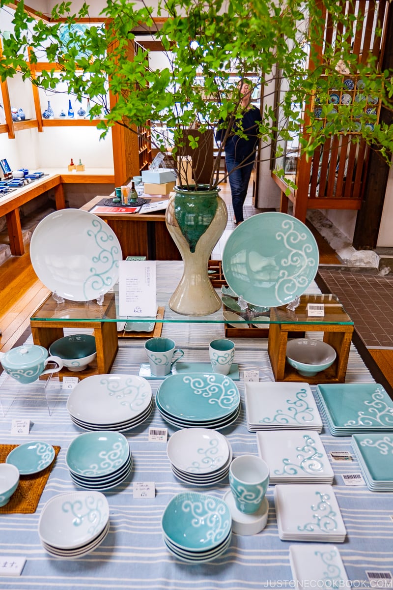 dishes and plates on display in porcelain shop in Okawachiyama Village