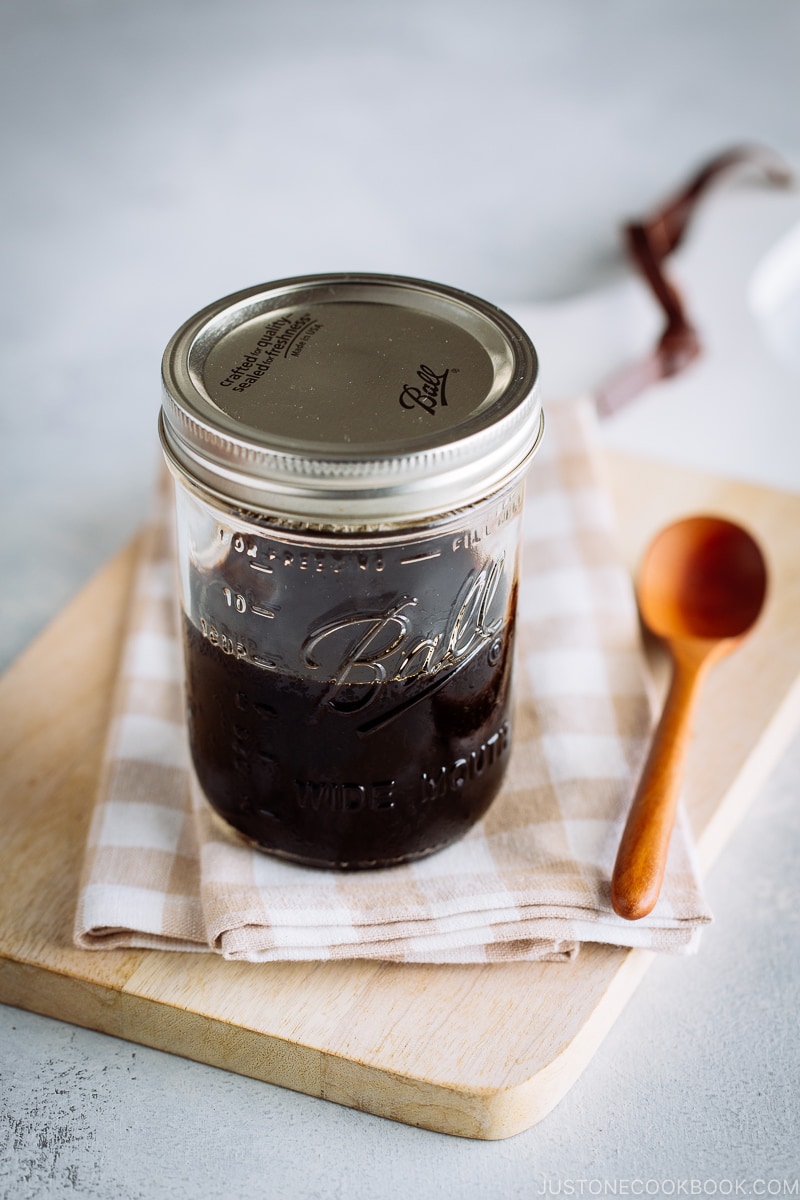 A mason jar filled with Homemade Teriyaki Sauce.