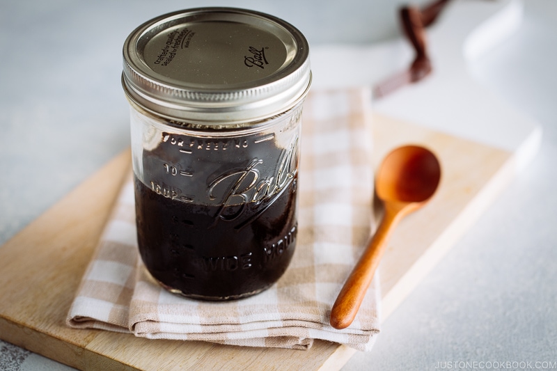 A mason jar filled with Homemade Teriyaki Sauce.