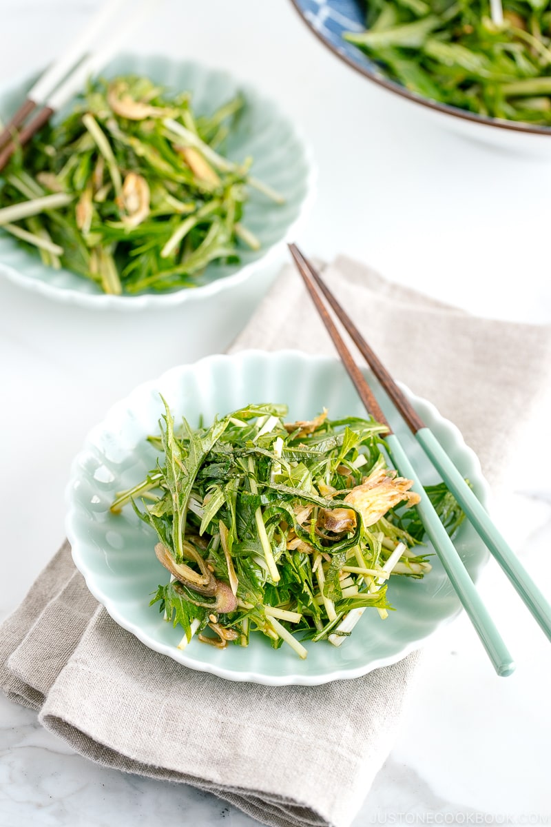 Light green plates containing Mizuna Myoga Salad.