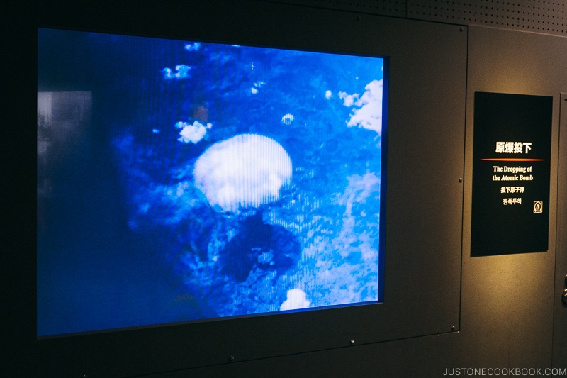 video of atomic bomb being dropped and mushroom cloud after