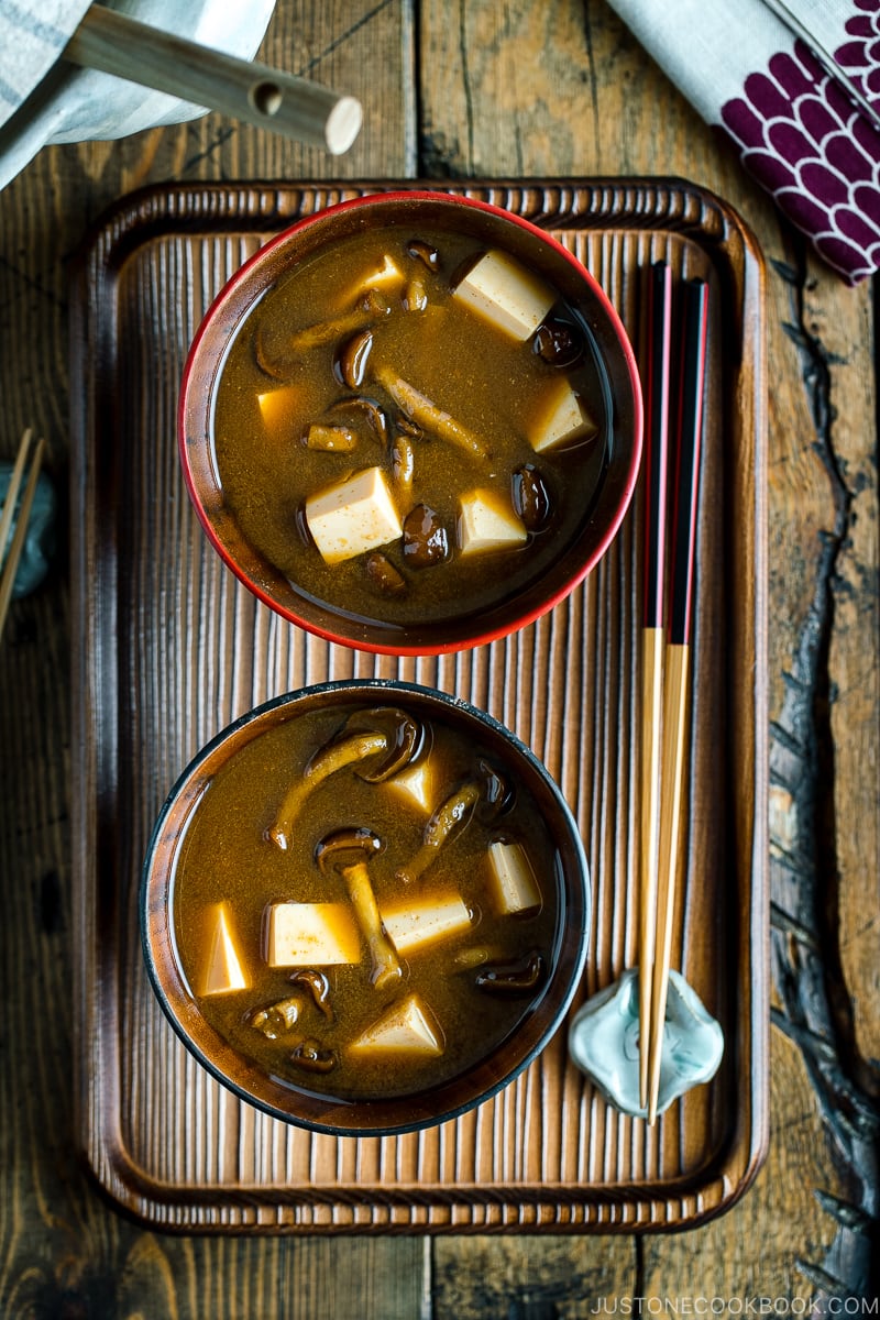 Japanese wooden bowls containing Nameko Mushroom Miso Soup.