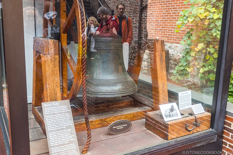 Revere Bell on display in a glass enclosure