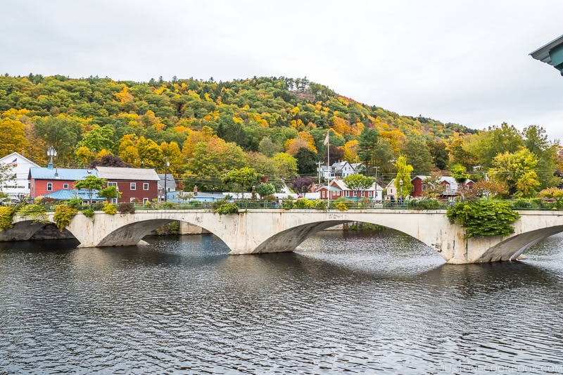 Bridge of Flowers across the Deerfield River with a hill in the background