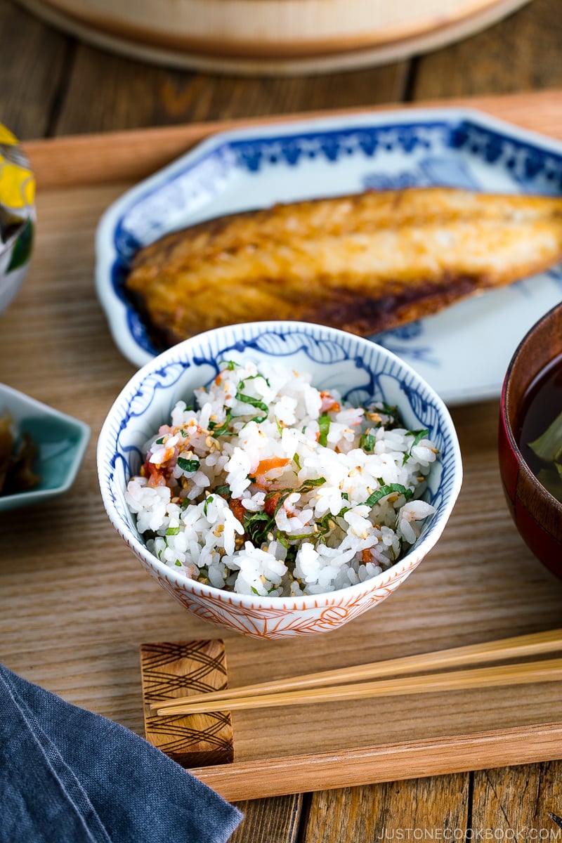 A rice bowl containing Ume and Shiso Rice served with mackerel and miso soup.