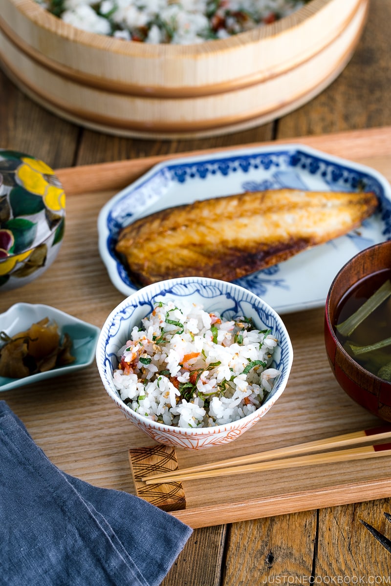 A rice bowl containing Ume and Shiso Rice served with mackerel and miso soup.