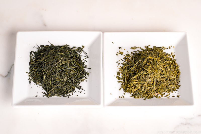 green tea leaves on 2 white plates