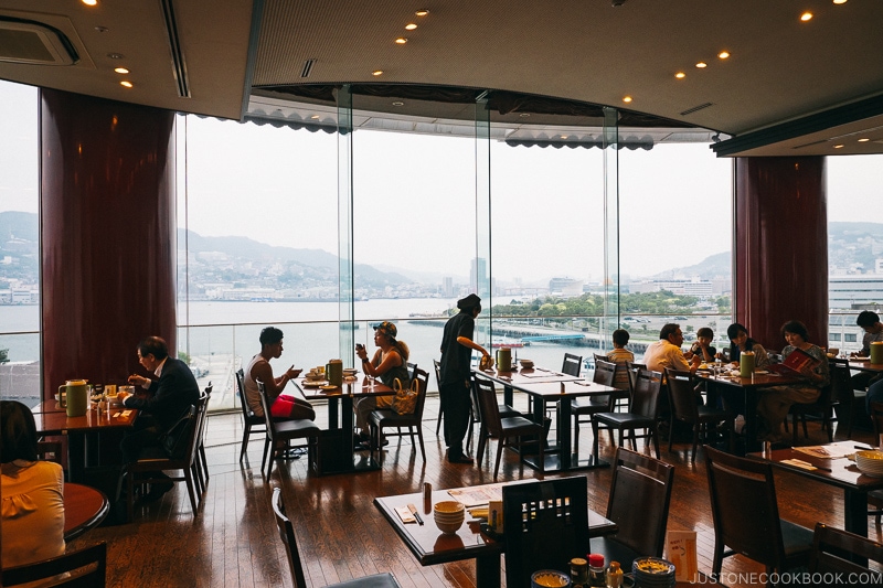 dining room with large windows looking out into the bay