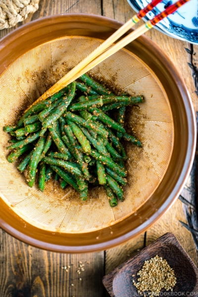 Green bean gomaae in a Japanese ceramic mortar.