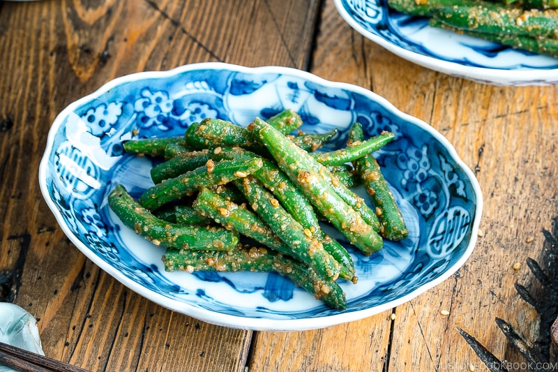 A blue and white dish containing Green bean Gomaae.