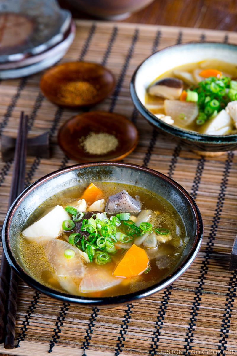 Handmade ceramic bowls containing Kenchinjiru (Japanese Vegetable Soup)