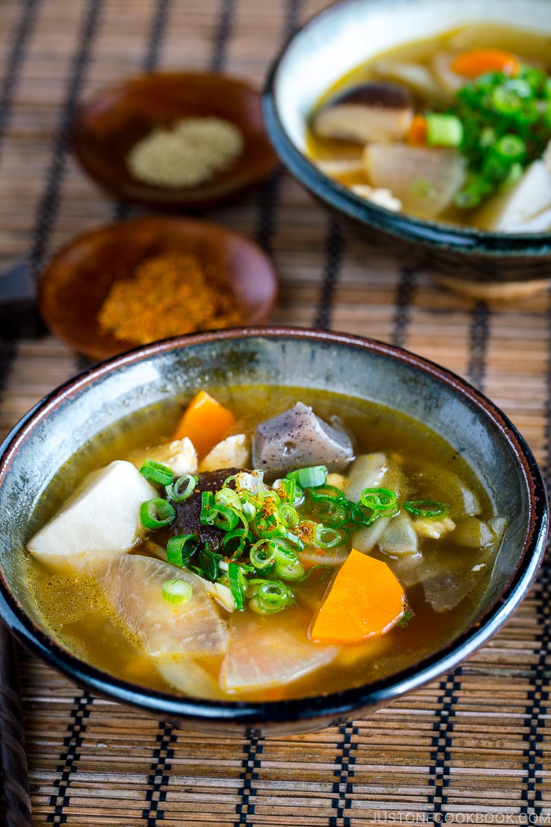 Handmade ceramic bowls containing Kenchinjiru (Japanese Vegetable Soup)