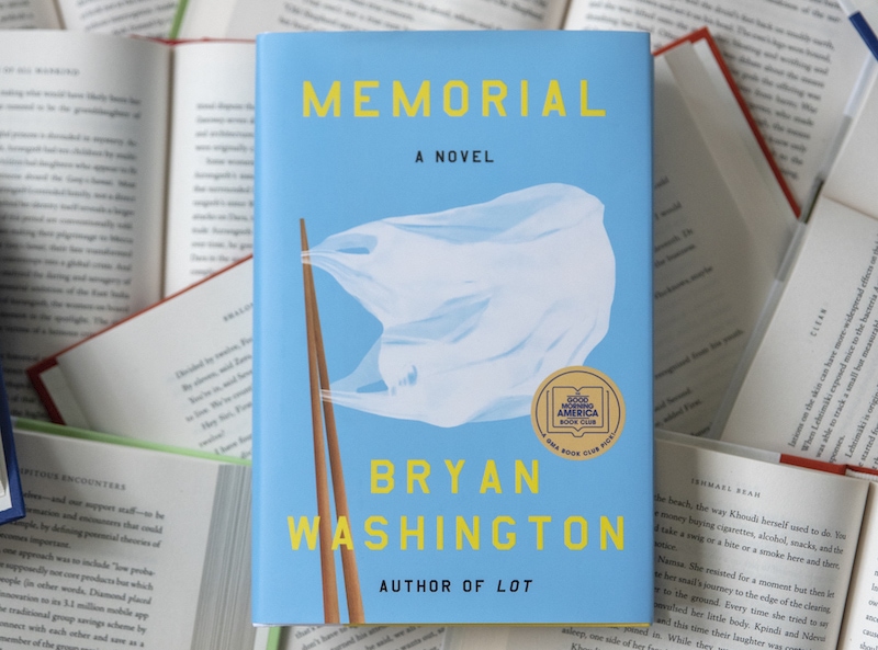 lifestyle shot of Memorial debut novel by Bryan Washington