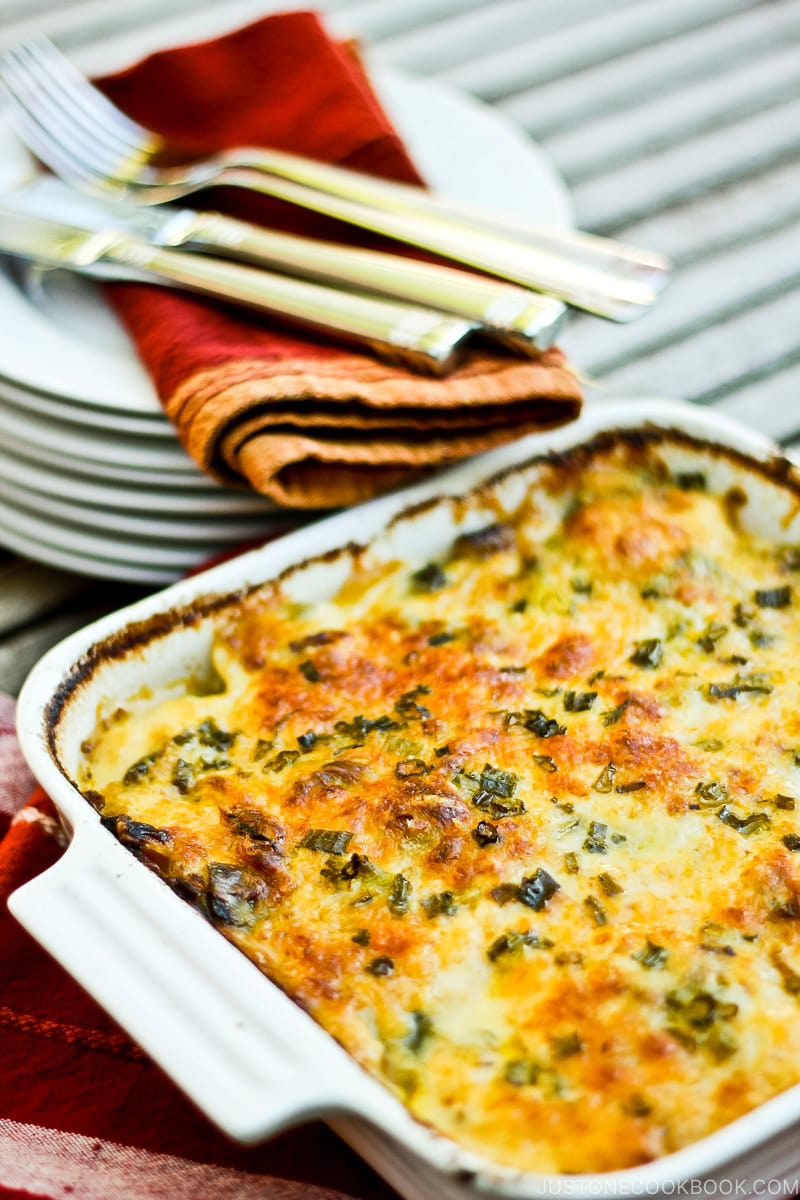 A baking dish containing Potato Leek Gratin