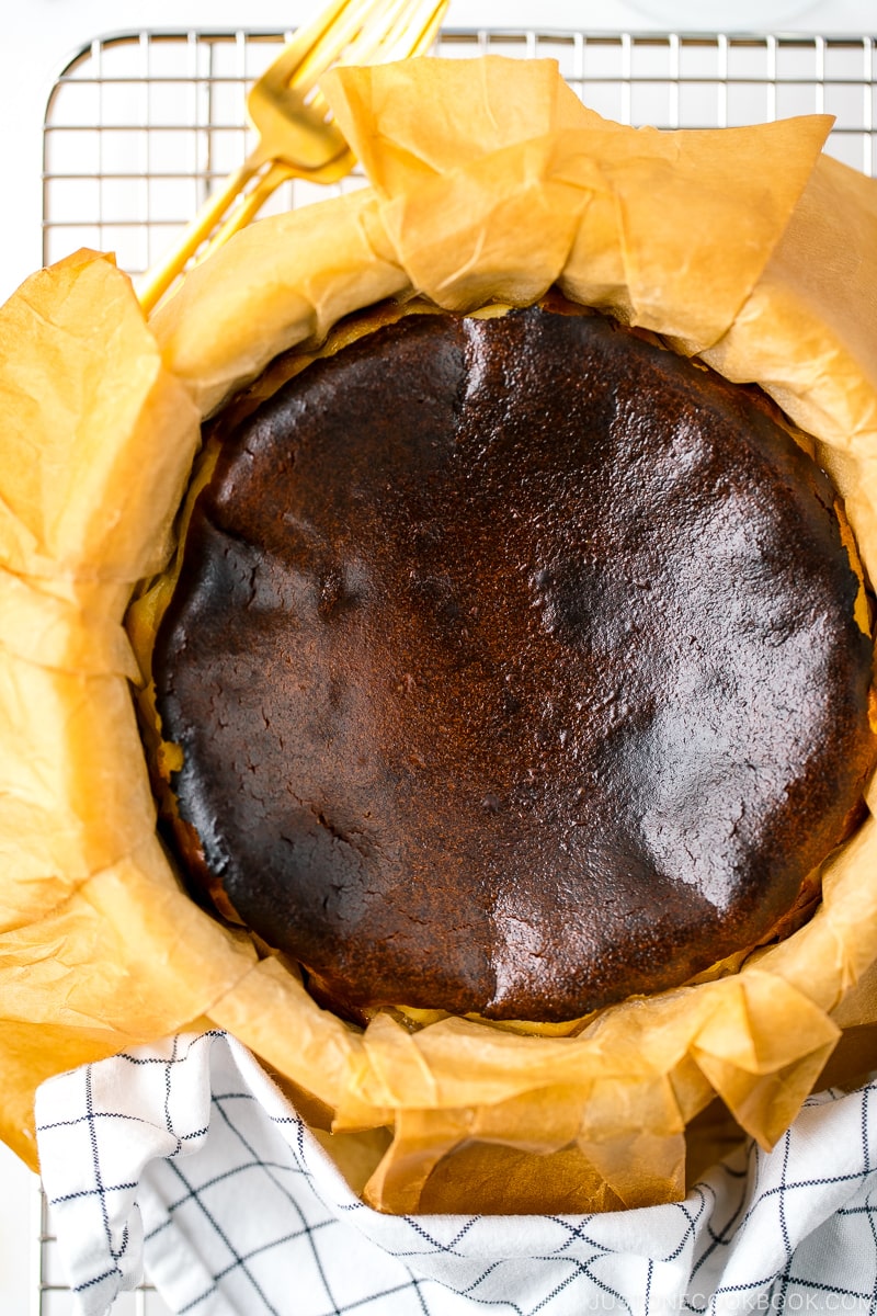 A cake pan containing Basque Burnt Cheesecake.