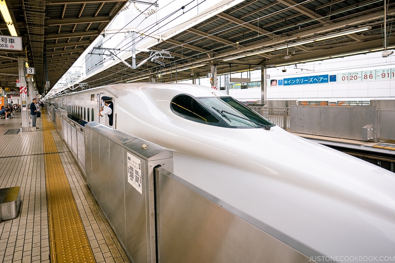 shinkansen train arriving at station