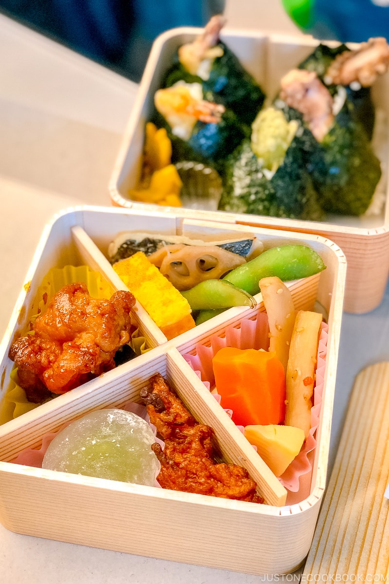 two bento boxes on a train table