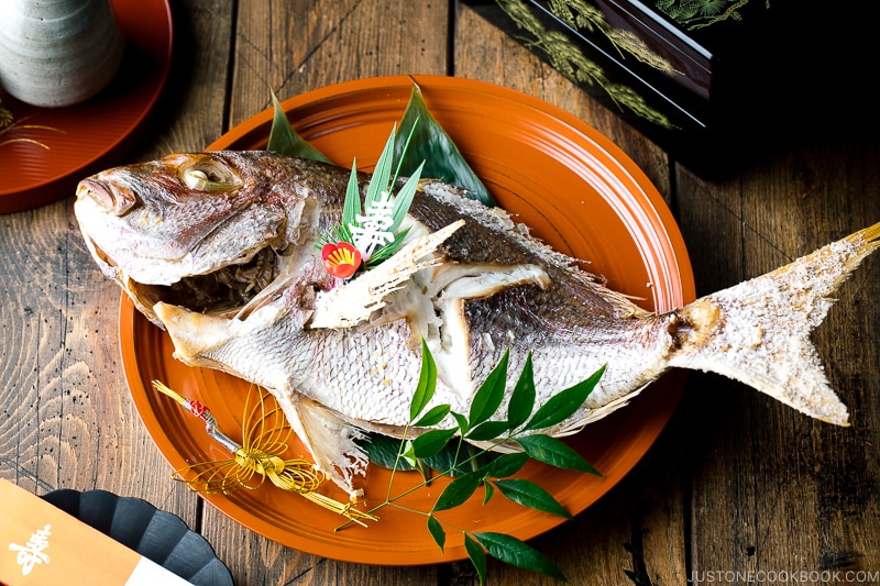 A lacquer tray containing a whole Japanese Baked Sea Bream.