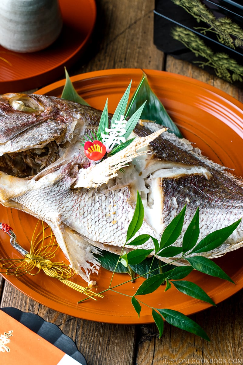 A lacquer tray containing a whole Japanese Baked Sea Bream.