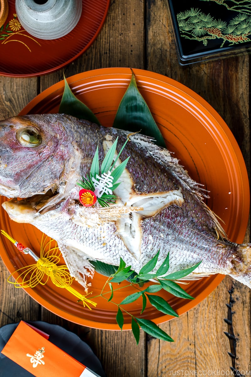 A lacquer tray containing a whole Japanese Baked Sea Bream.
