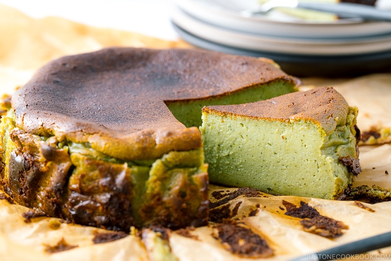 A Matcha Basque Burnt Cheesecake on top of the parchment paper.