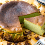 A Matcha Basque Burnt Cheesecake on top of the parchment paper.