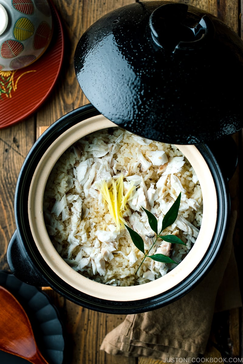 A Kamadosan (Japanese donabe) containing Tai Meshi (Japanese Sea Bream Rice) garnished with julienned ginger.