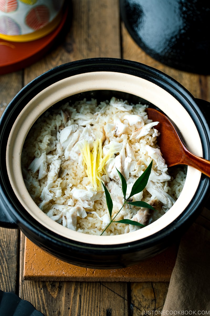 A Kamadosan (Japanese donabe) containing Tai Meshi (Japanese Sea Bream Rice) garnished with julienned ginger.