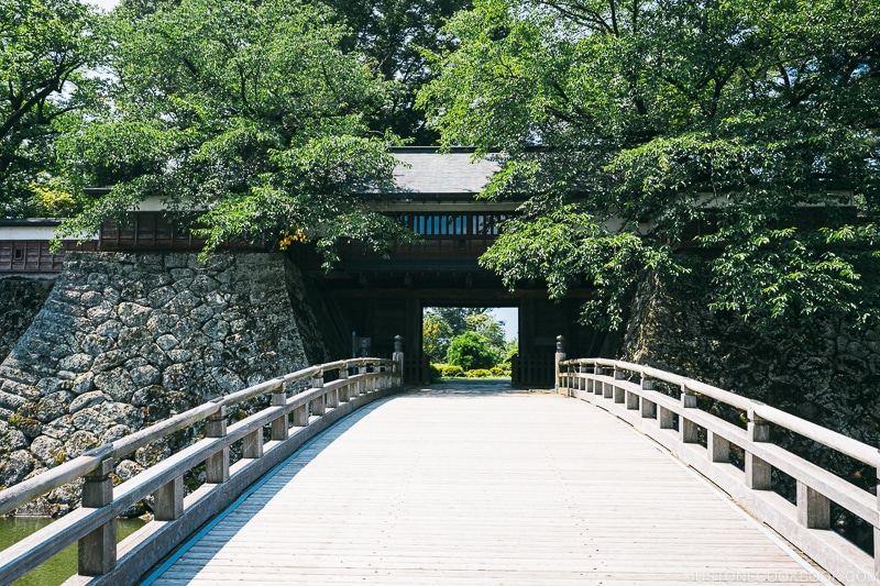 a bridge leading to a gate