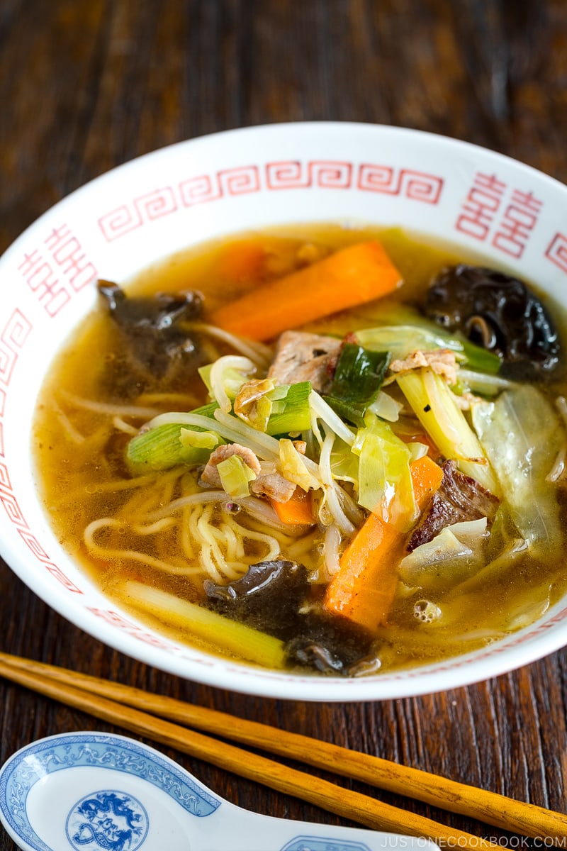 A ramen bowl containing tan men.