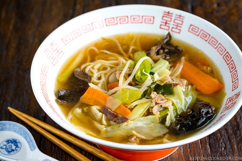 A ramen bowl containing tan men.