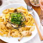 A white plate containing ume shiso pasta.