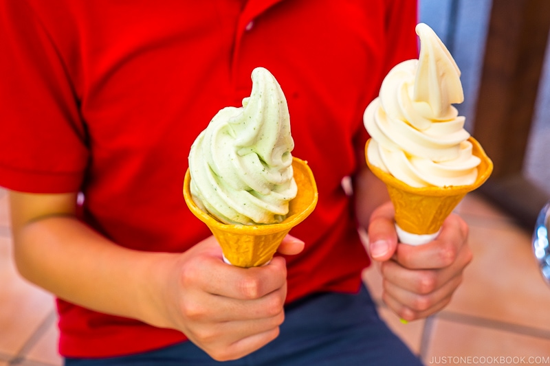 boy holding two softcream in his hands