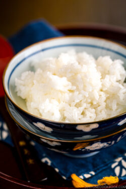Steamed rice in Japanese rice bowls.