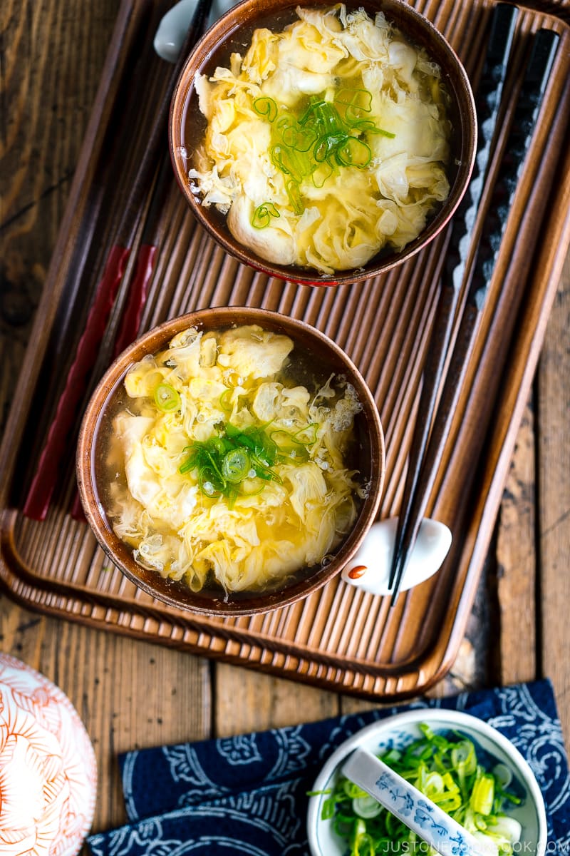 Wooden miso soup bowls containing Kakitamajiru, Japanese egg drop soup.