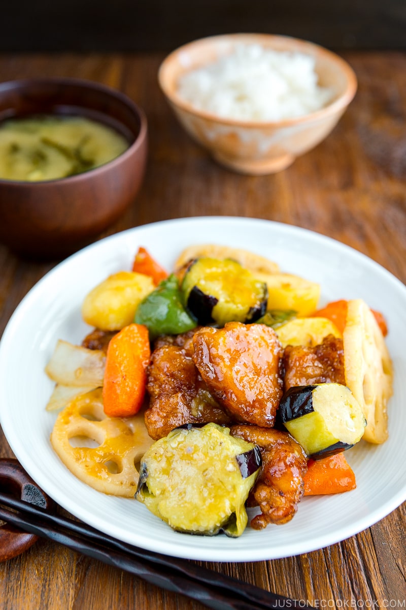 A white plate containing Ootoya’s Sweet and Sour Chicken.