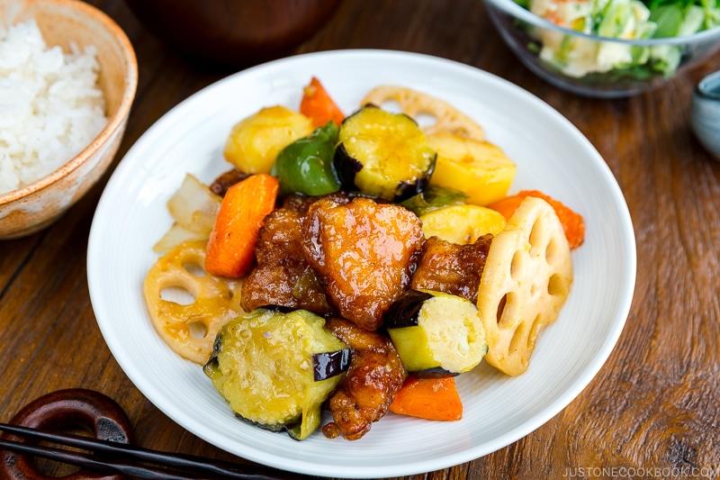 A white plate containing Ootoya’s Sweet and Sour Chicken.