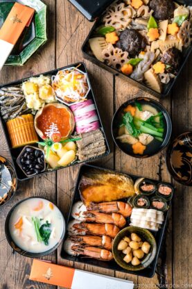 Osechi ryori in 3 tier boxes.