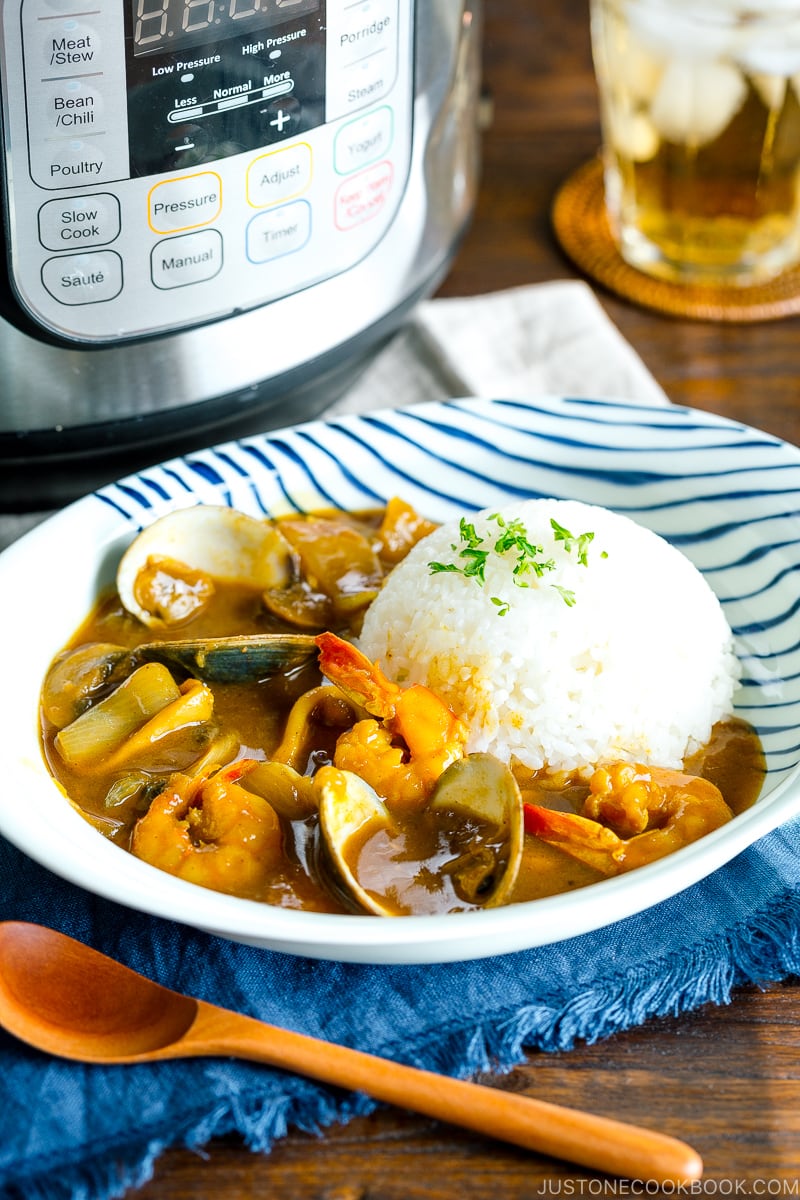 A plate containing Japanese seafood curry made with pressure cooker.