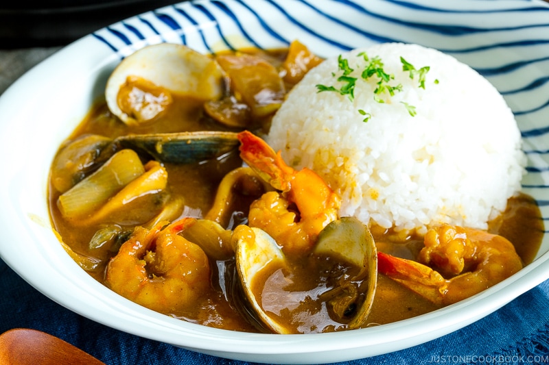 A plate containing Japanese seafood curry made with pressure cooker.