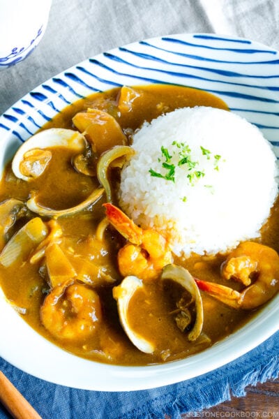 A plate containing Japanese seafood curry made with pressure cooker.