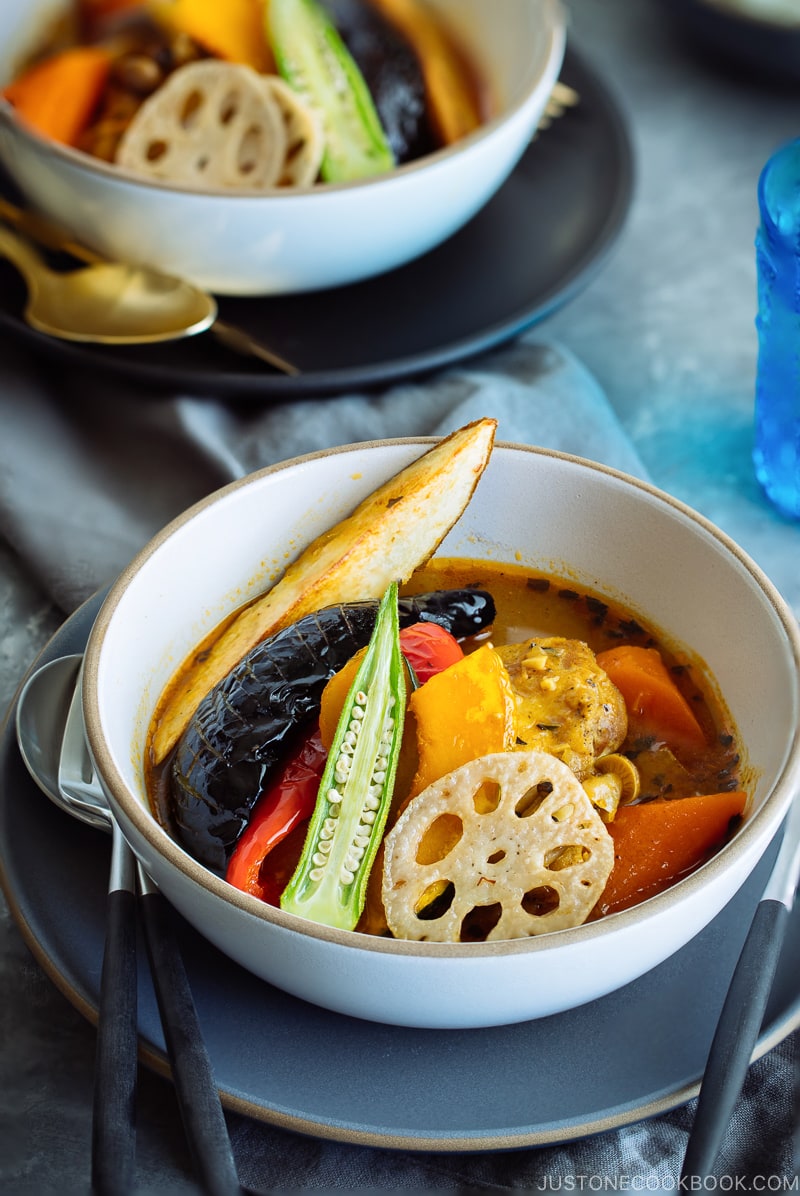 A white bowl containing sapporo soup curry.