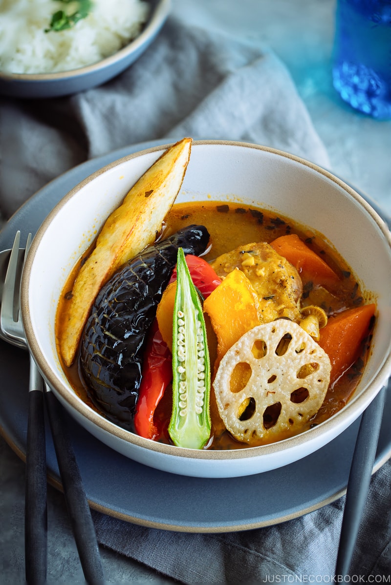 A white bowl containing sapporo soup curry.